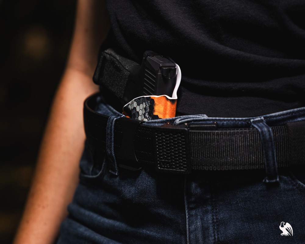 Woman carrying a CCW holster from Vedder Holsters