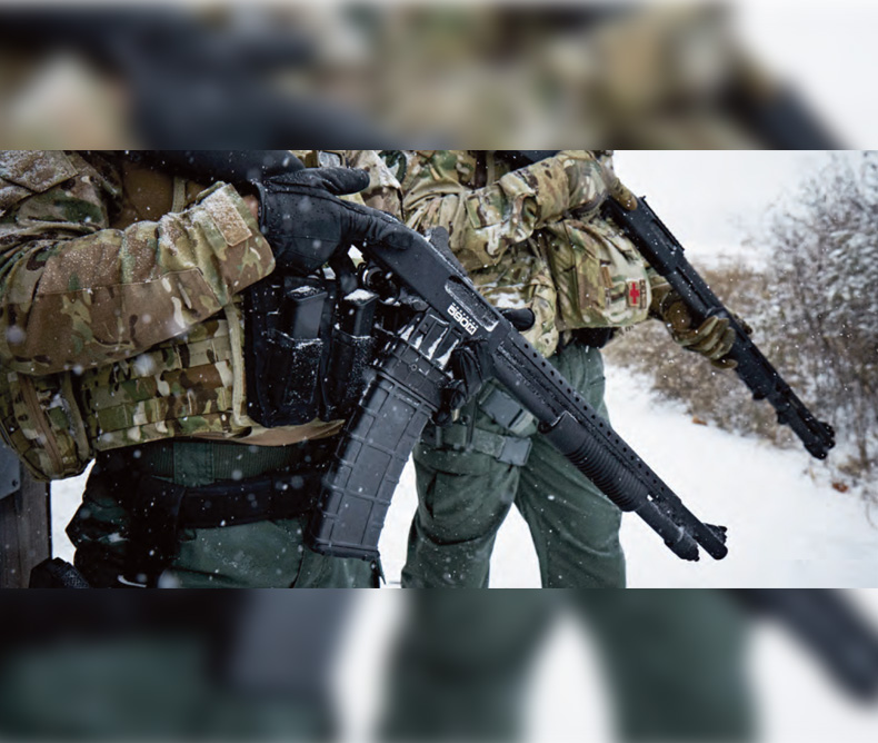 Soldiers holding the new Mossberg 590M Professional Shotgun Series