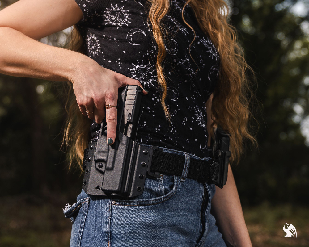 Woman carrying her LightDraw OWB Kydex Holster.