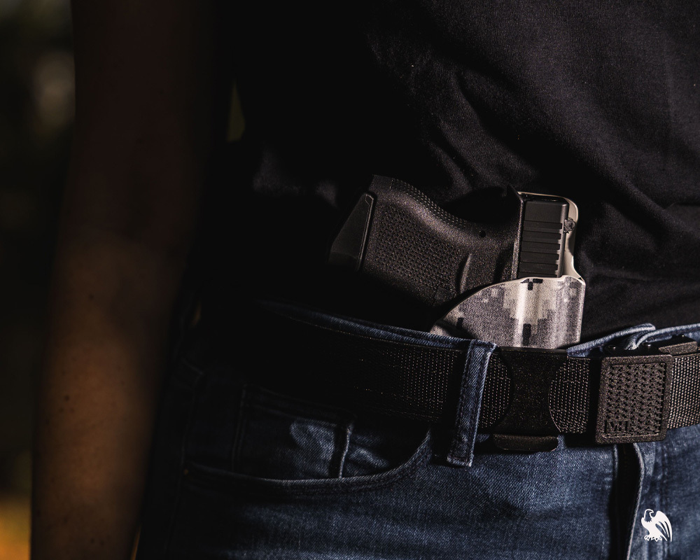 Woman carrying a IWB Holster from Vedder Holsters. 