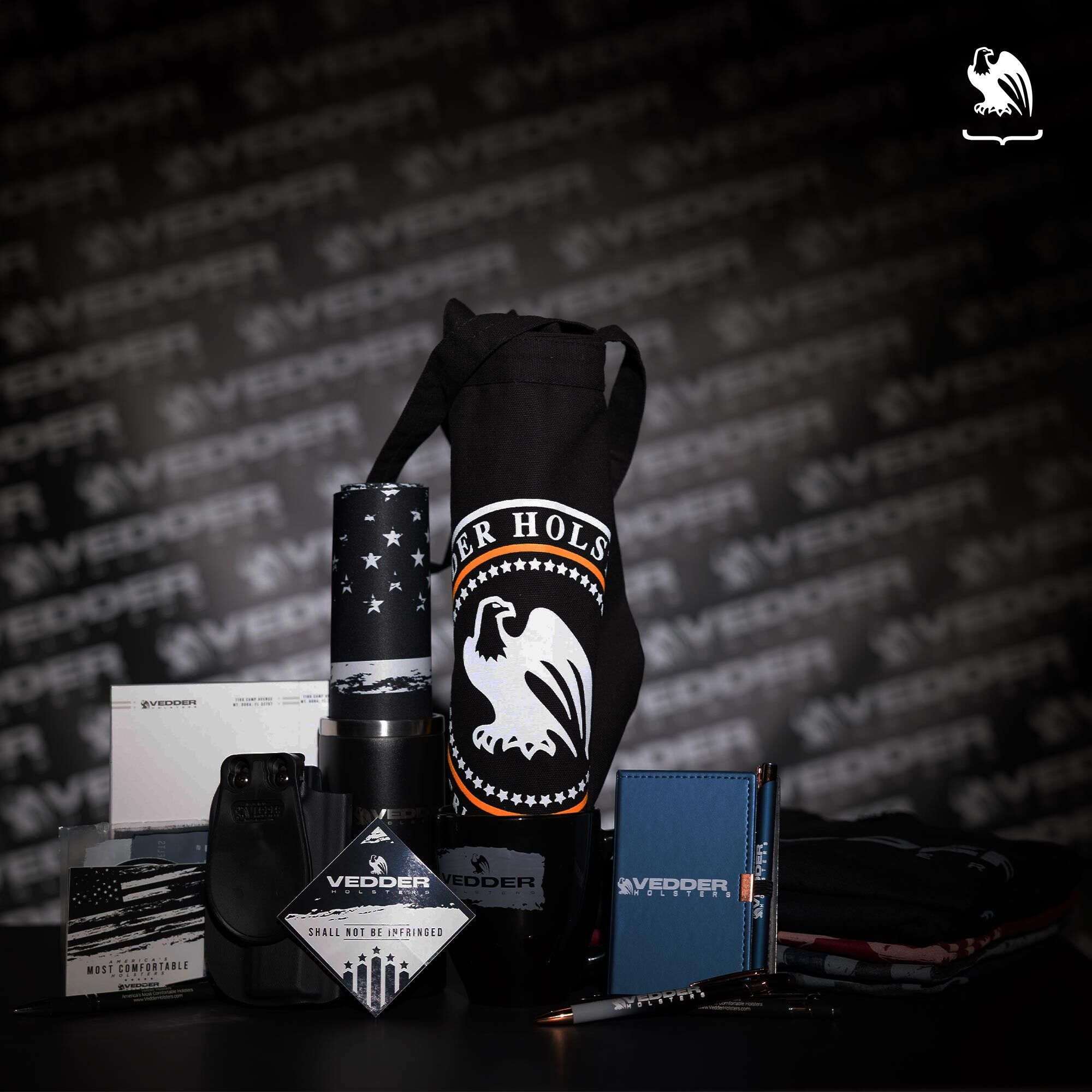 1 million order package including a holster, an exclusive tumbler, tote bag, mug, pens and notebook as well as a cleaning mat, gun belt, sticker pack and one of every shirt we offer.