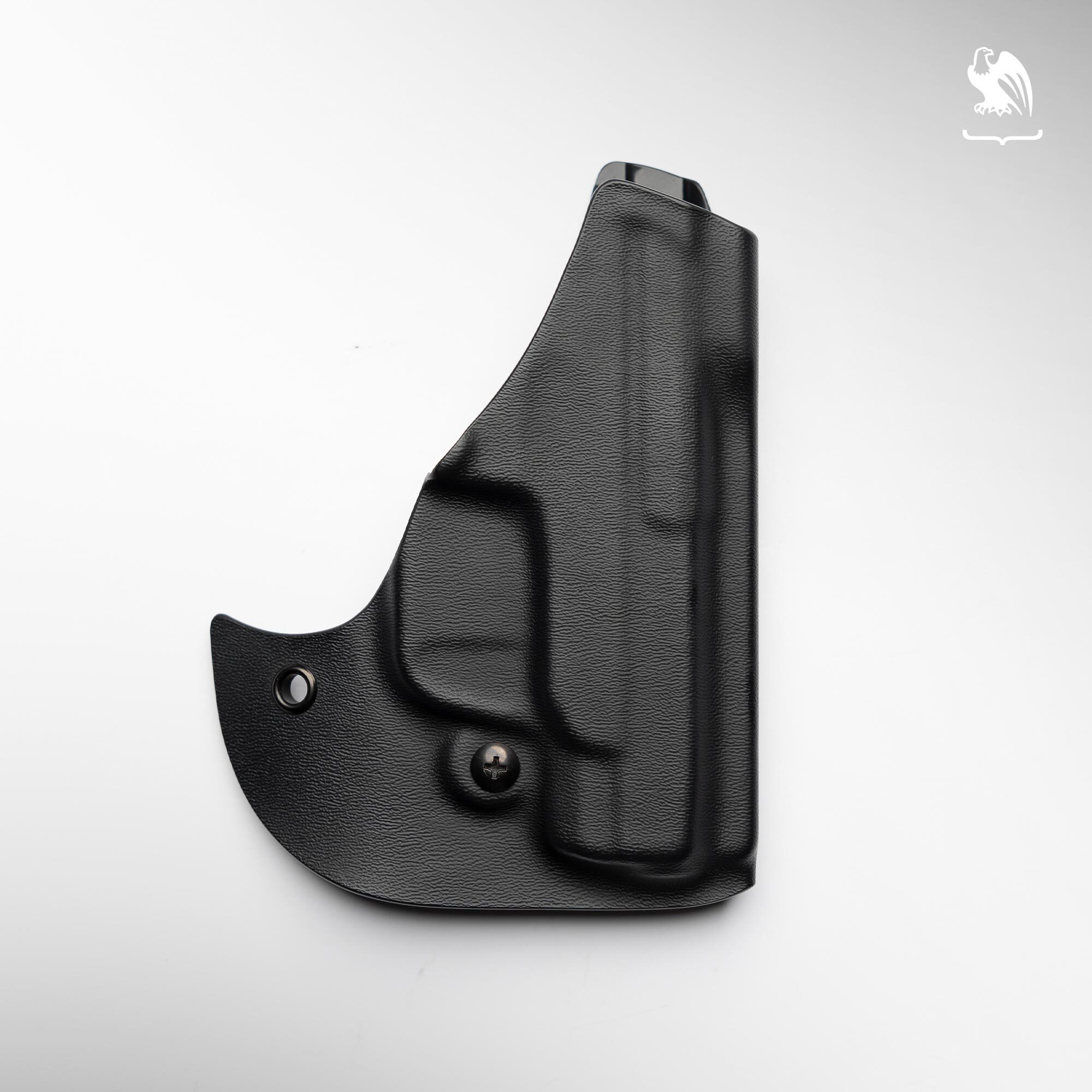 lack Kydex IWB holster with adjustable retention screw and integrated belt clip, shown on a clean white background &mdash; inside-the-waistband concealed carry holster for compact pistols.