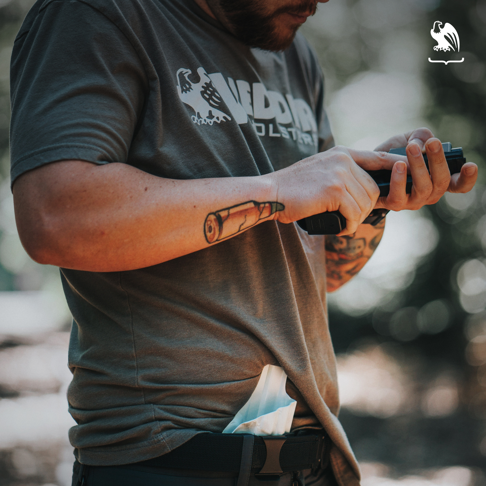 Man checking his gun