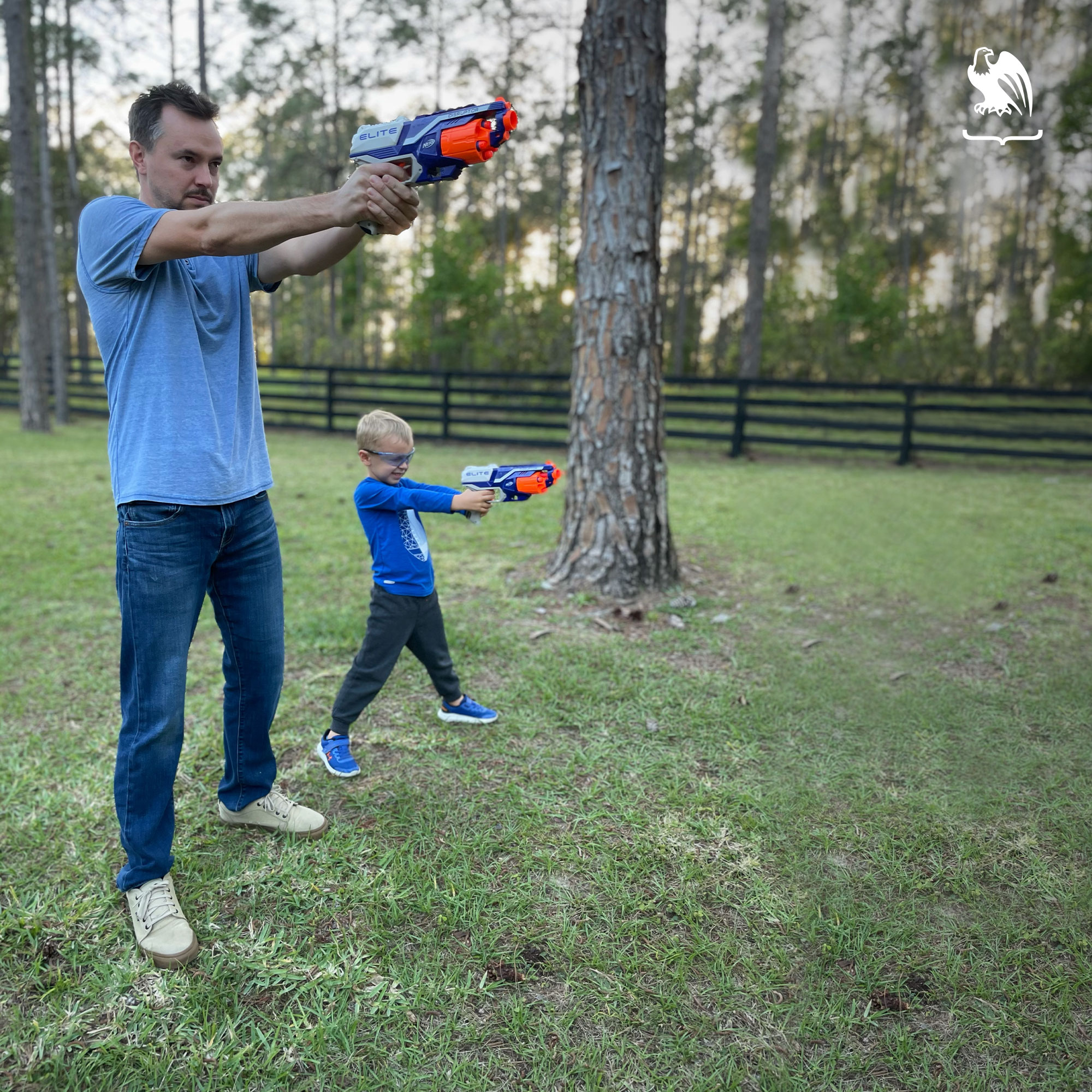 Father and son learning how to aim and shoot