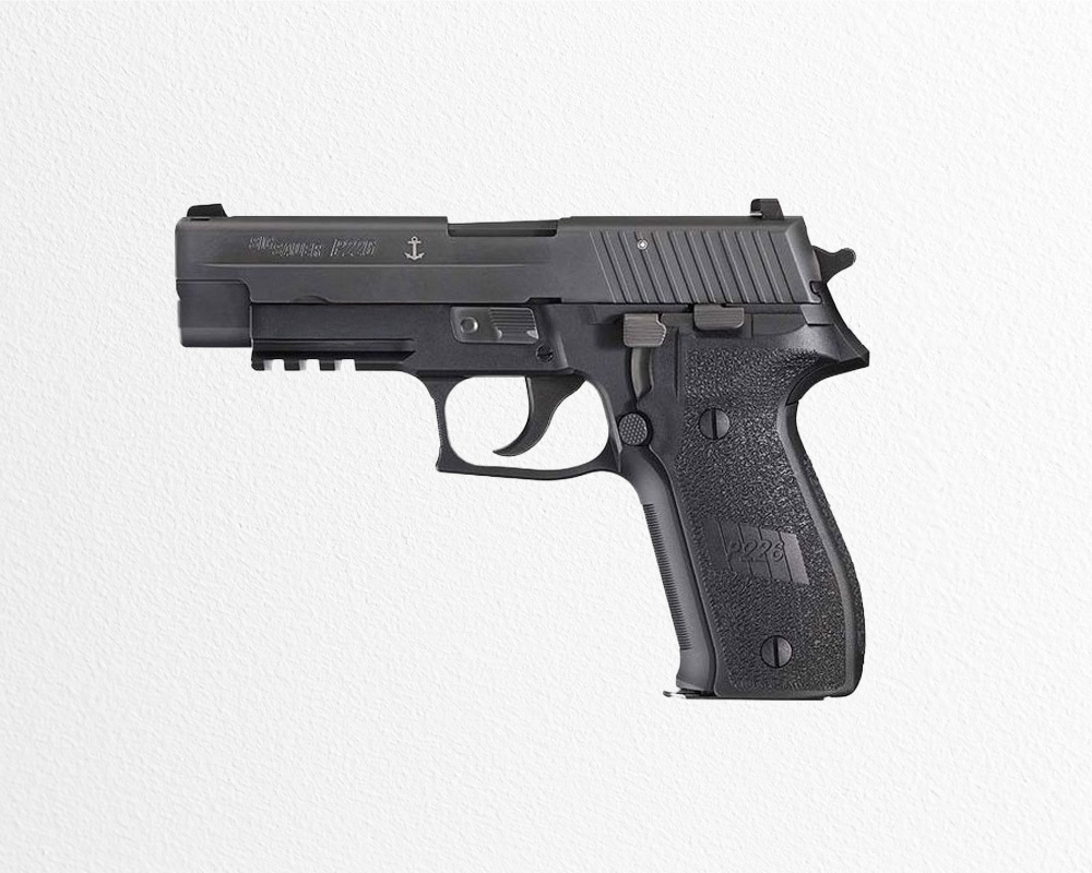 Sig Sauer P226 Navy 9mm pistol with black grips, tactical rail, and anchor engraving on slide.