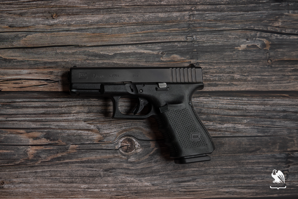 Glock 19 Handgun laying on a table