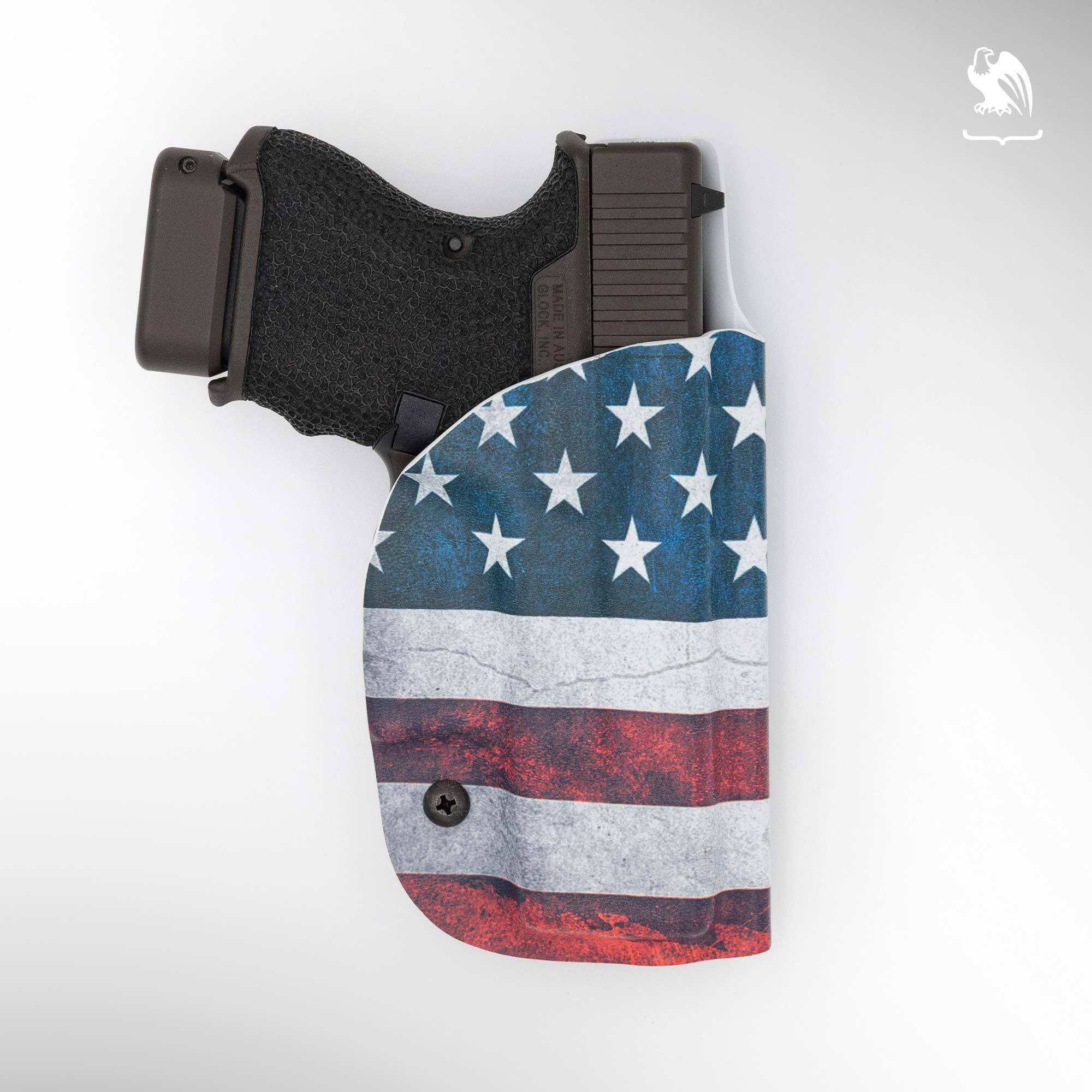 Glock 26 subcompact 9mm seated in an American flag Kydex IWB concealed carry holster