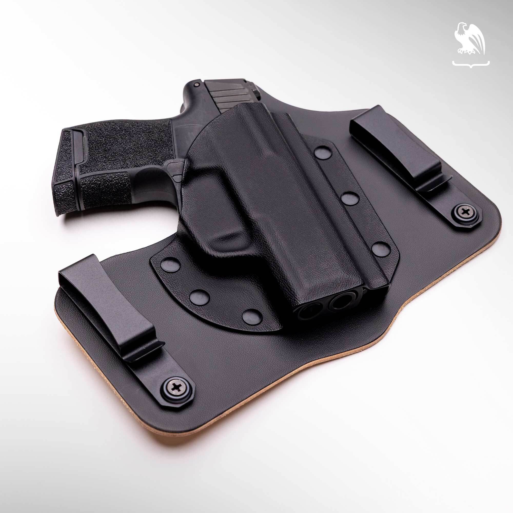Vedder Holsters Comforttuck. IWB hybrid holster laying down on a white background.