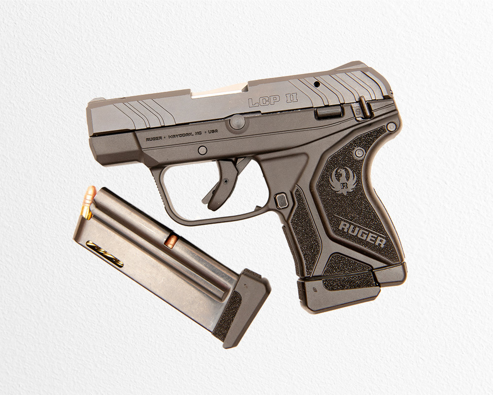 Ruger LCP II .380 ACP pistol with a detachable magazine loaded with hollow-point self-defense ammunition, designed for concealed carry and personal protection.