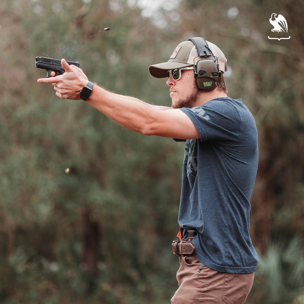 Can you carry a gun in a National Forest? - Vedder Holsters Generic Photography of a man shooting outdoors 