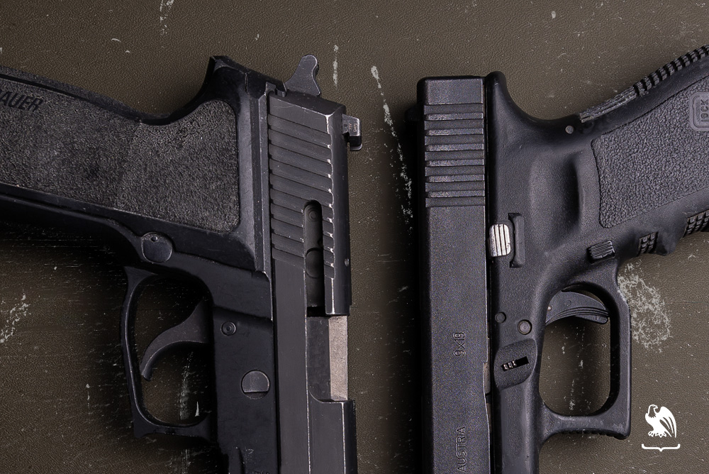 Glock 19 vs Sig P229: Ergonomics - Close up from both Glock 19 and Sig P229