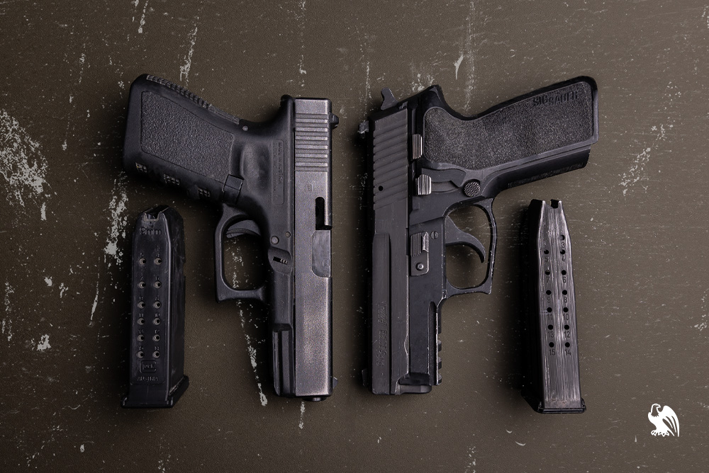 Sig P229 vs Glock 19: Size & Capacity - Handguns and Magazine for both gun models photography