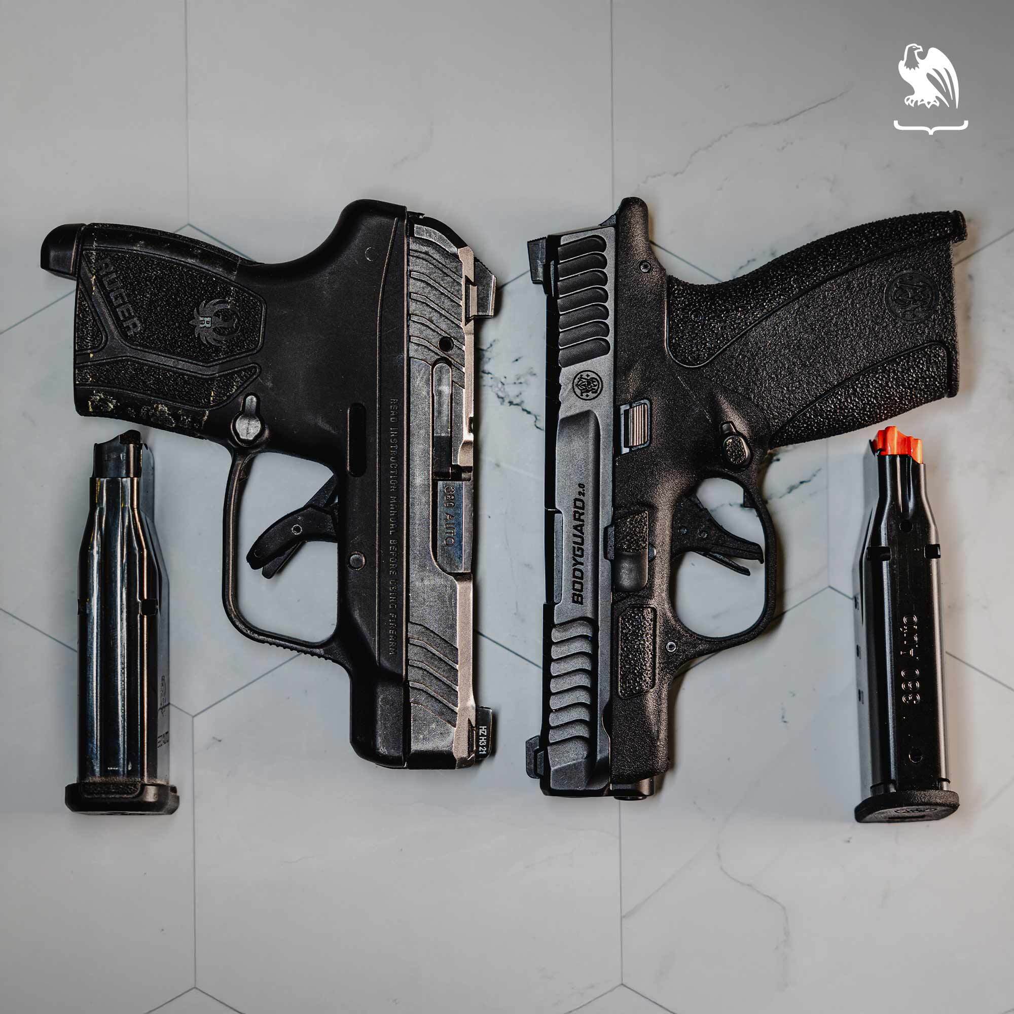 Top-down view of two compact semi-automatic handguns displayed with their magazines, showing overall dimensions, grip texture, and capacity features often evaluated for concealed carry and self-defense use.