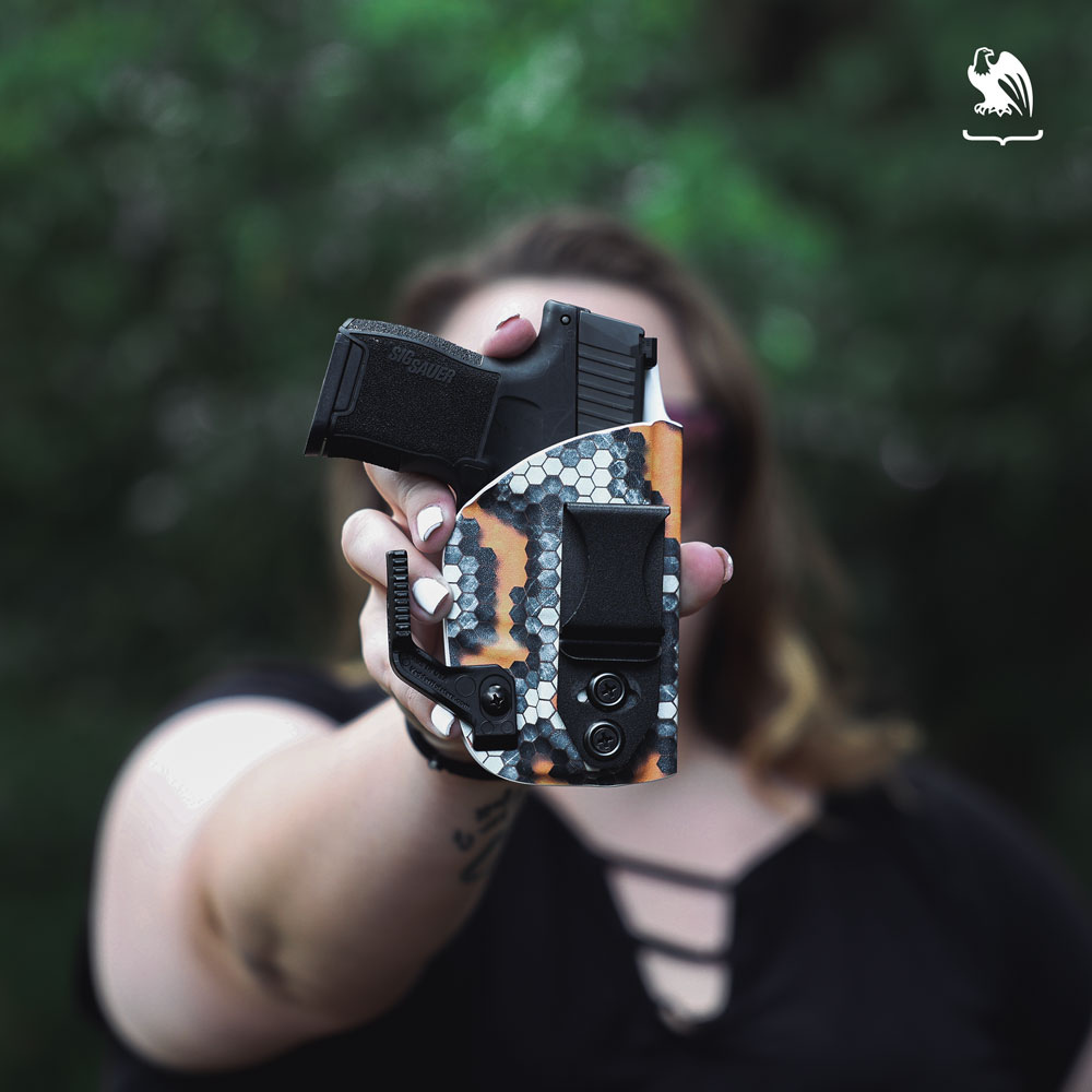 Safety - Handgun displayed inside a Vedder holster 