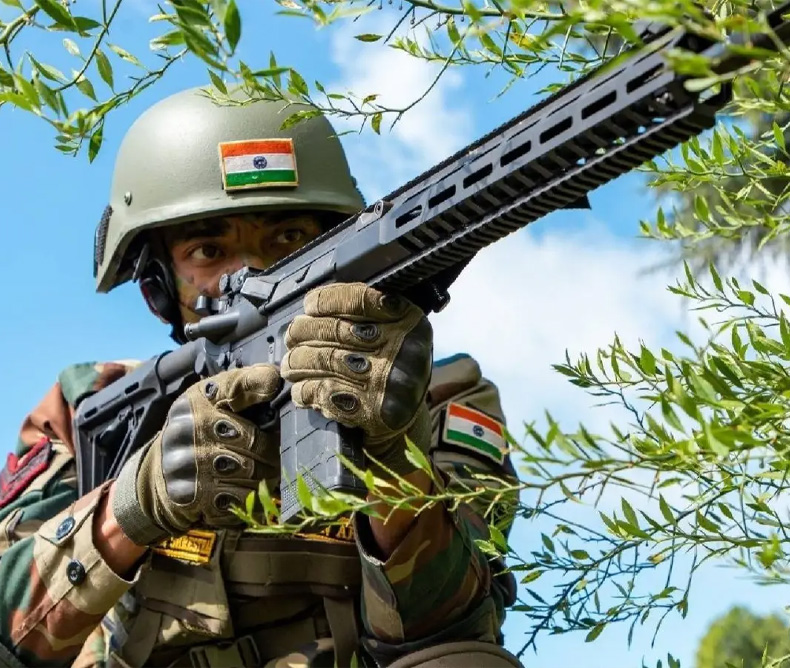 Indian Military Soldier holding a rifle 