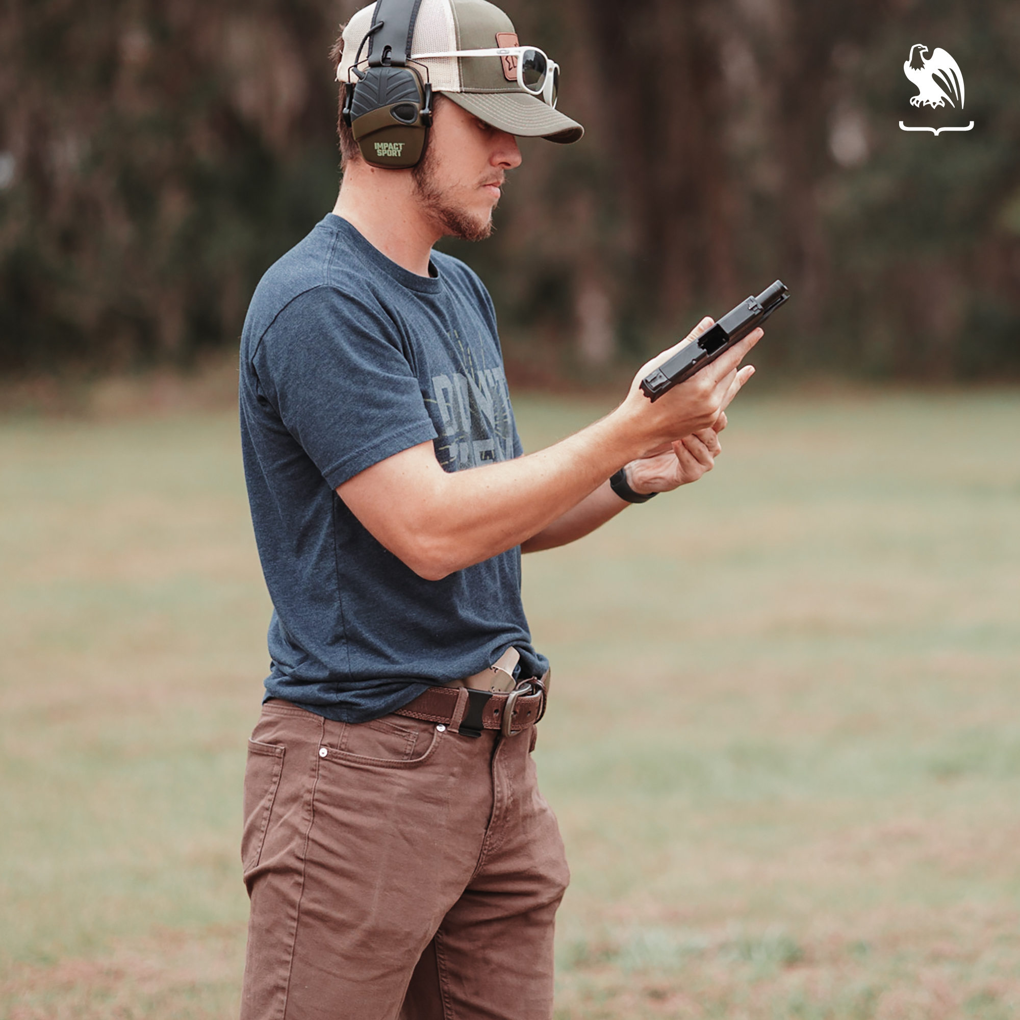 What is a CCW Class? - Model holding a gun wearing a Vedder Holster