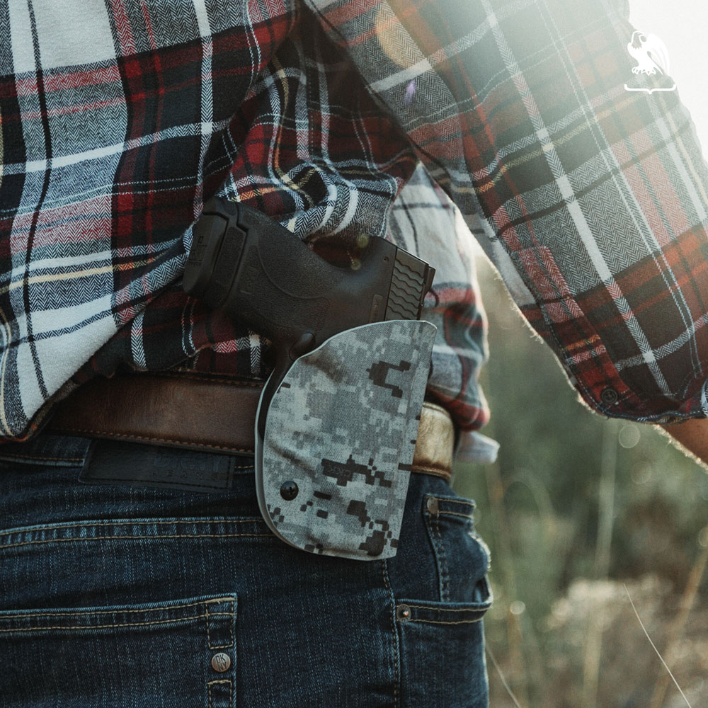 What is concealed carry insurance? -  Person carrying a Vedder Holsters ProDraw OWB Paddle Holster