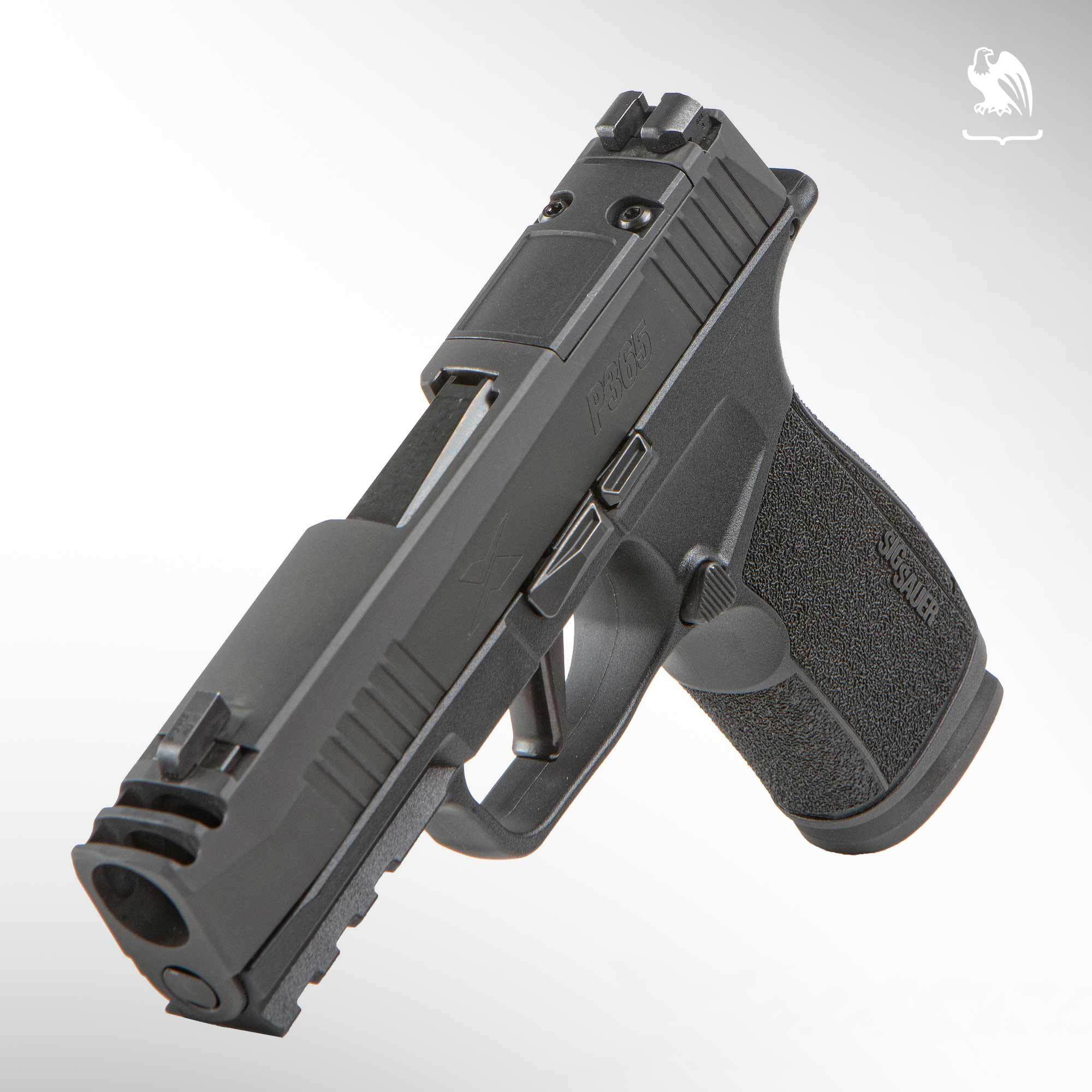 Sig P365 X-Macro 9mm compact pistol showing integrated compensator, flat trigger, and optics-ready slide